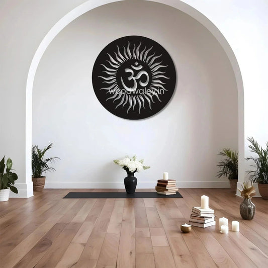 Handcrafted wooden Om wall decor with sun design in a minimalist living room, yoga mat, candles, plants, and books.