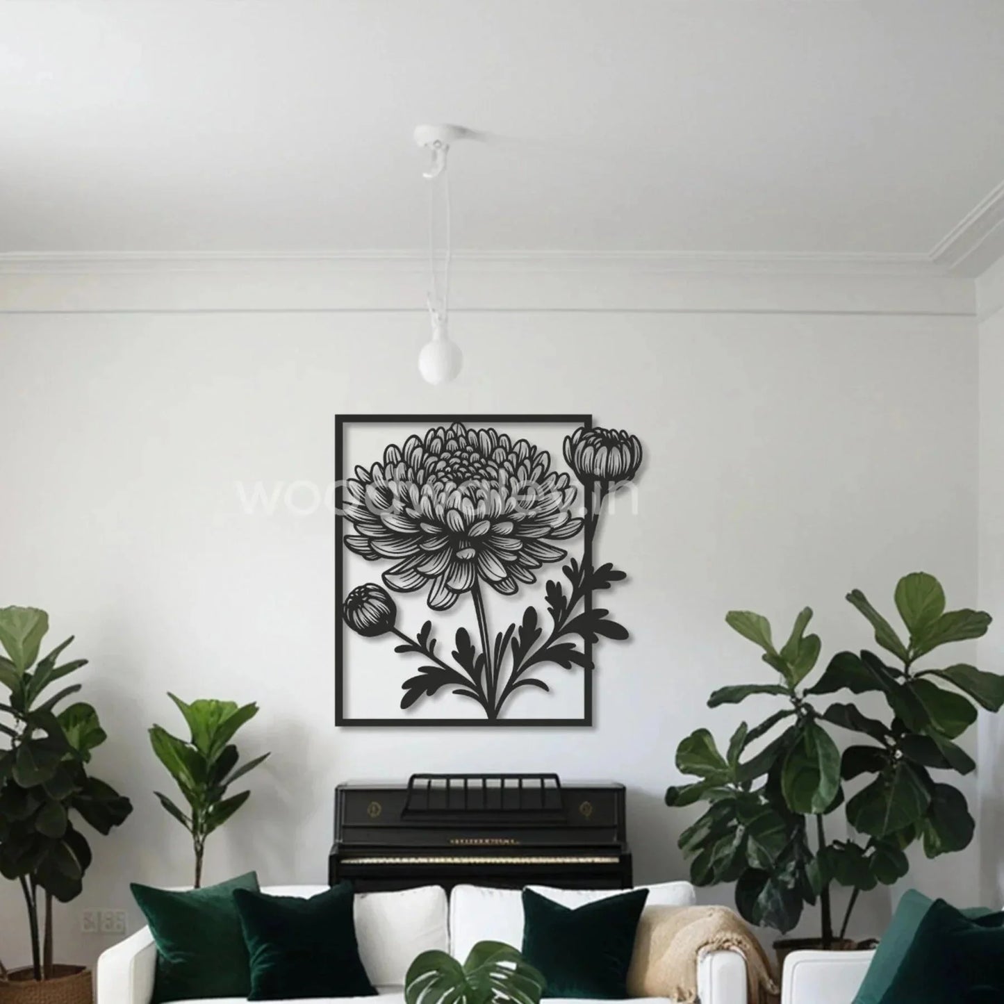 Modern living room with black wooden floral wall art, green plants, and a piano