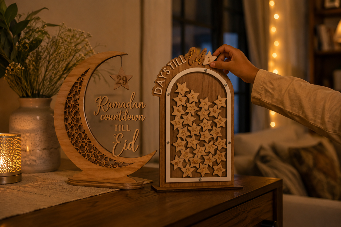 Wooden crescent moon countdown display and arched dropbox countdown jar with numbered stars on a console table