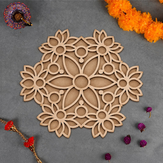 Kamala Vistaar rangoli styled flatlay with marigolds and diya