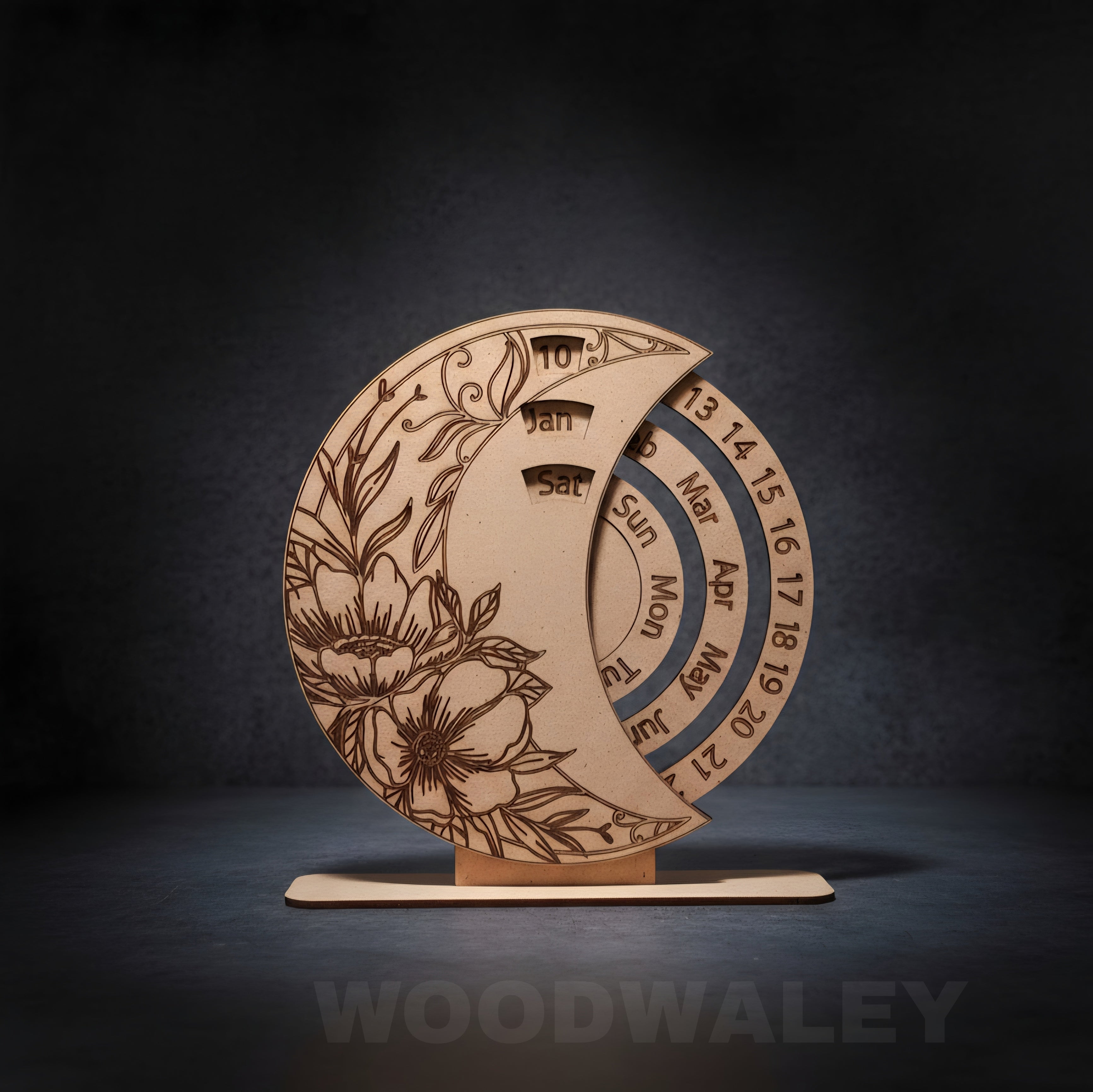 Wooden moon phase calendar with floral designs on a dark background, branded 'Woodwaley'.