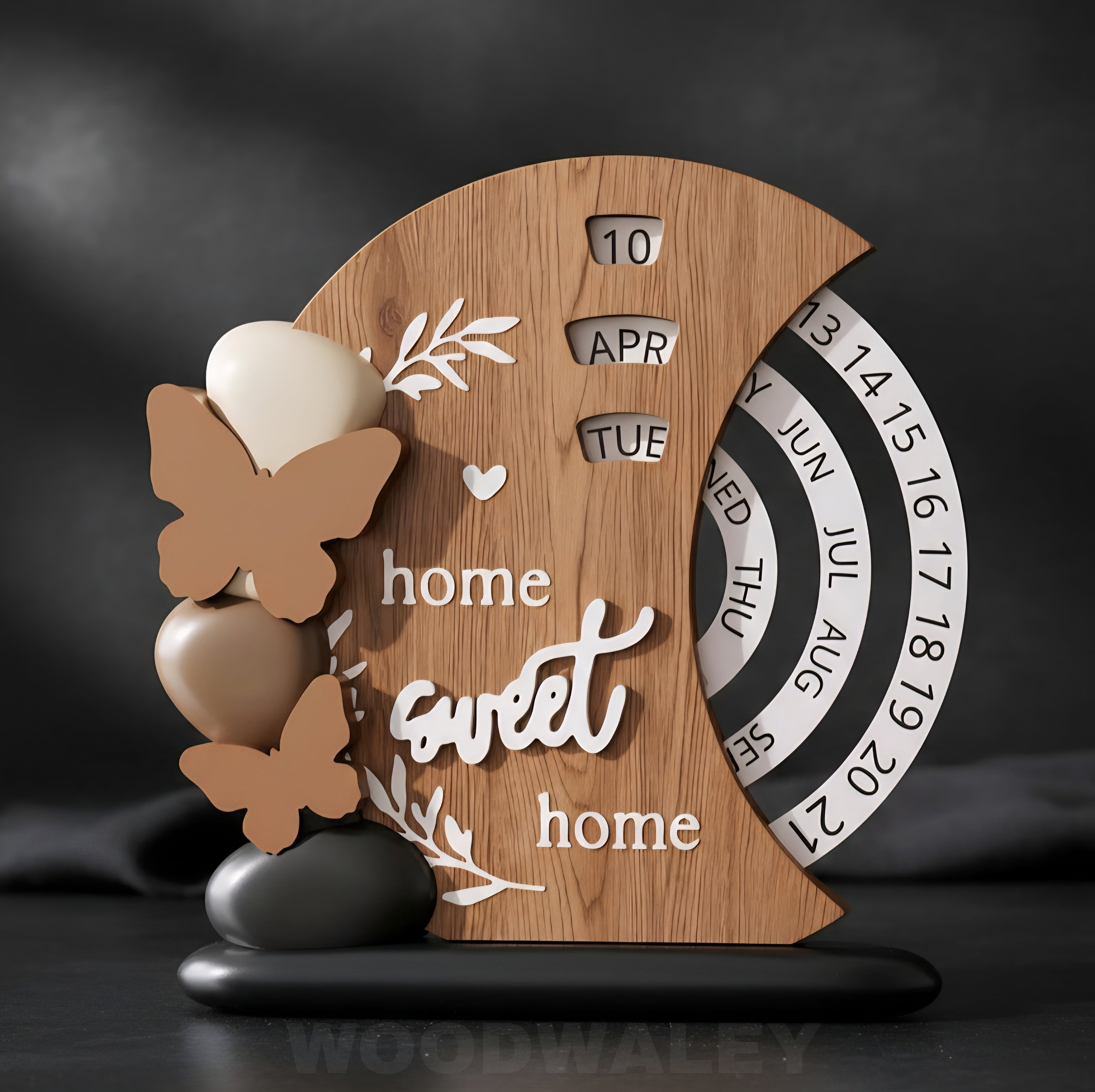 Wooden decorative item with 'home sweet home' text and calendar design on a dark background