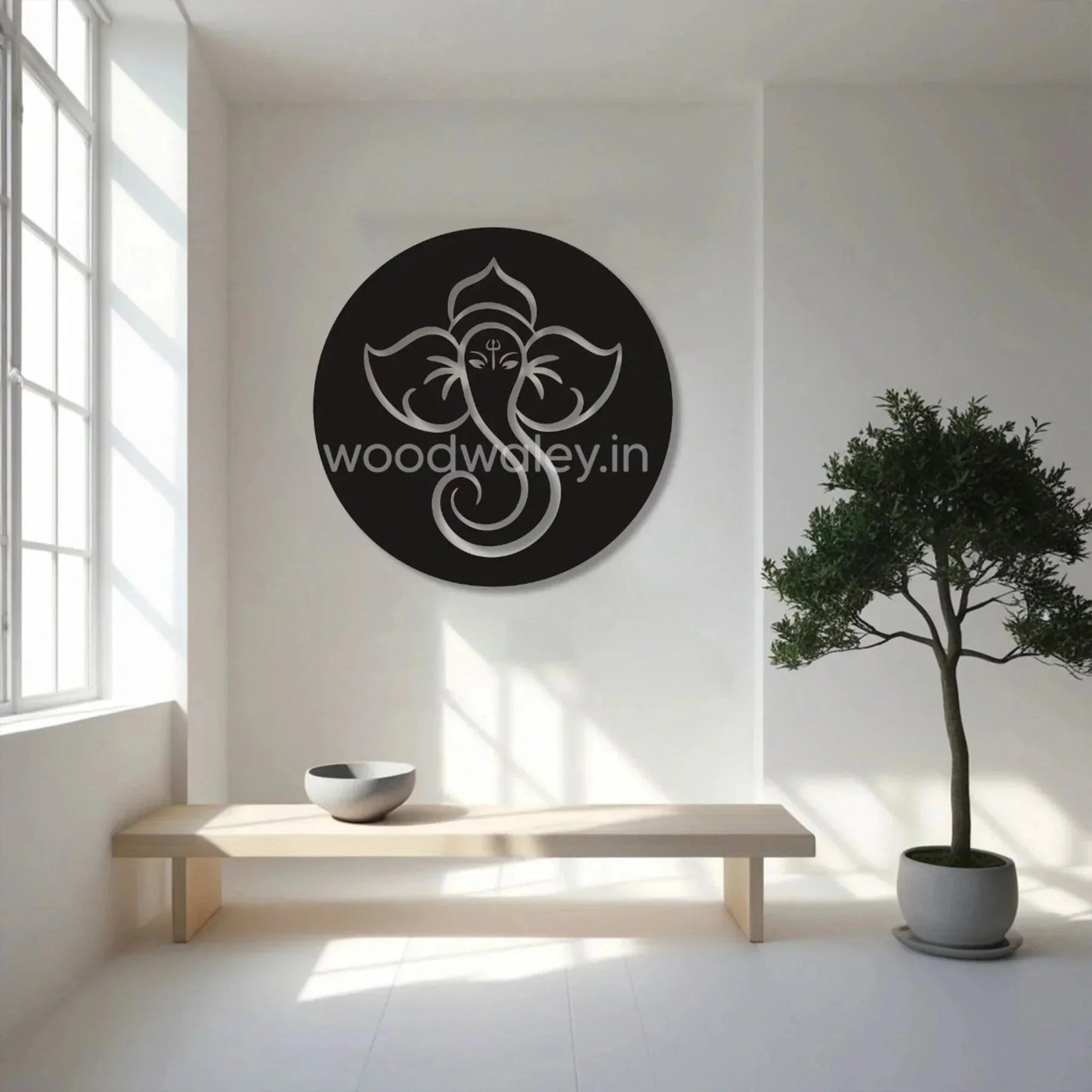 Minimalist wooden Ganesha wall art in a modern living room with bench and potted plant
