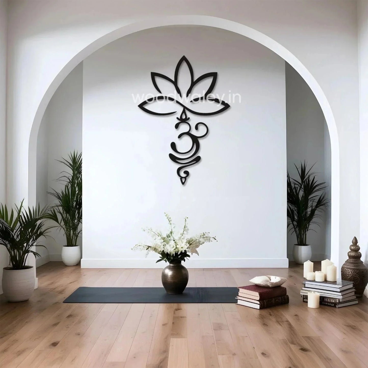 Handcrafted wooden Om wall decor in a modern living room with indoor plants and candles
