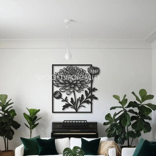 Modern living room with black wooden floral wall art, green plants, and a piano
