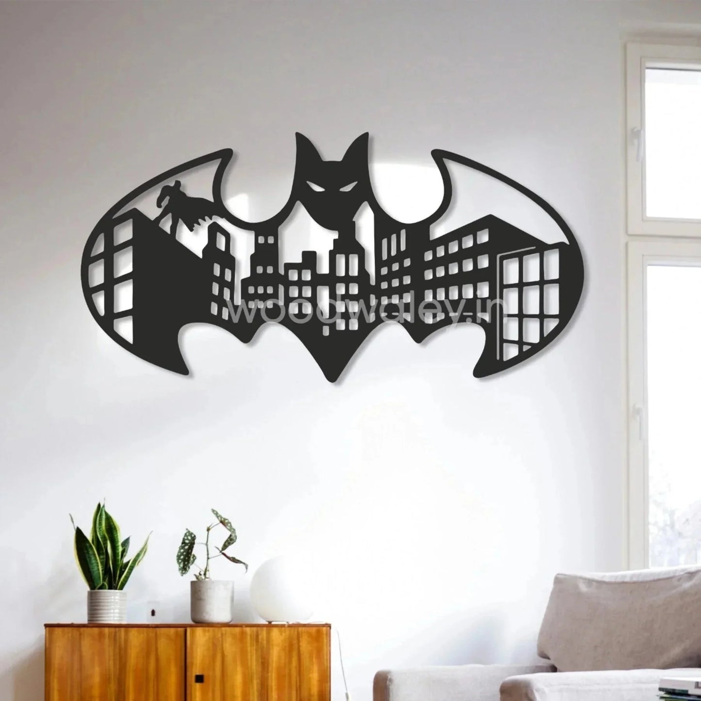 Handcrafted wooden wall art with bat silhouette and cityscape design in modern living room
