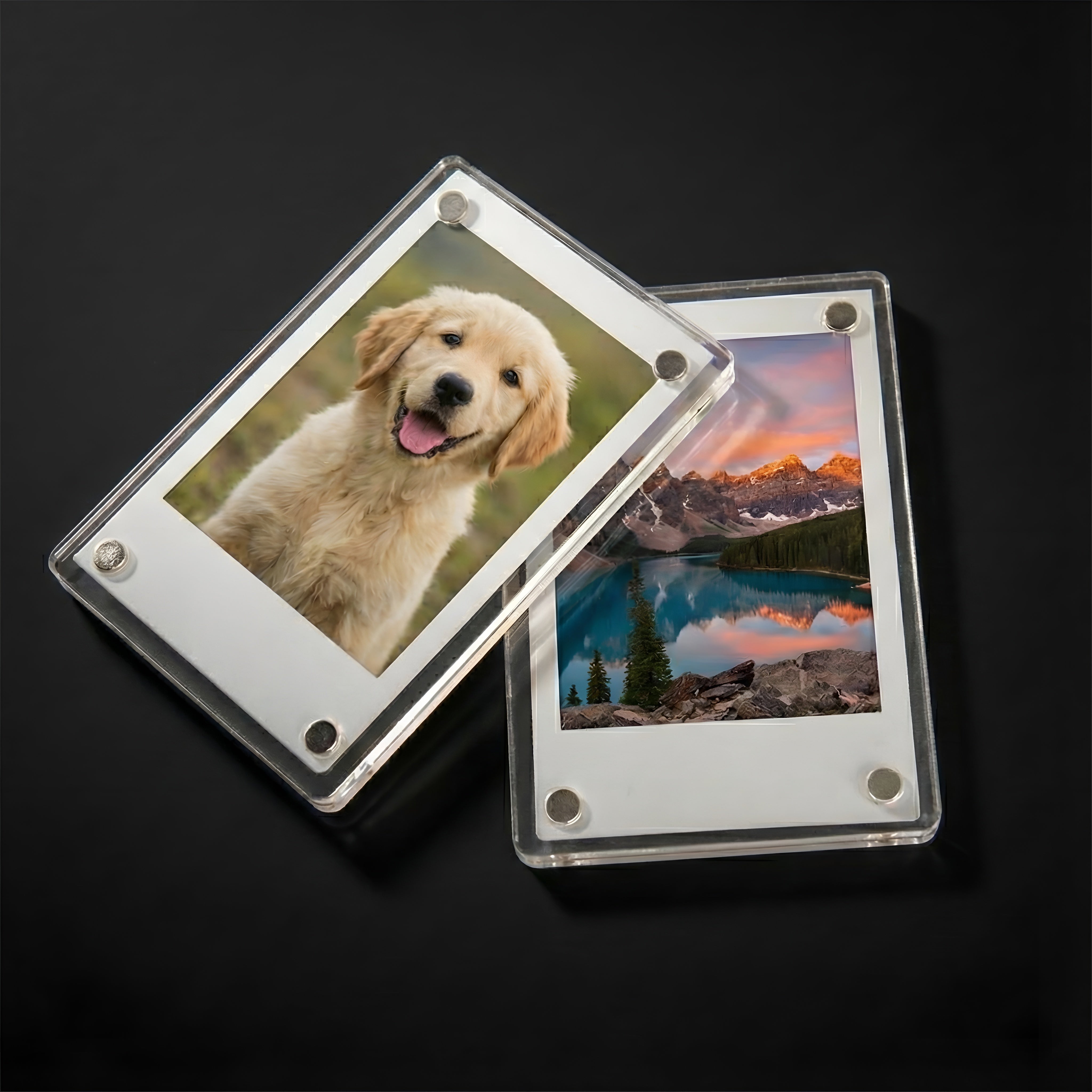Two transparent photo frames with images of a dog and a mountain landscape on a black background.